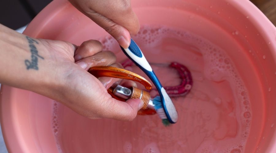 brushing a carabiner